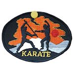 Karate plus Silhouetten Embleem -zwart/oranje